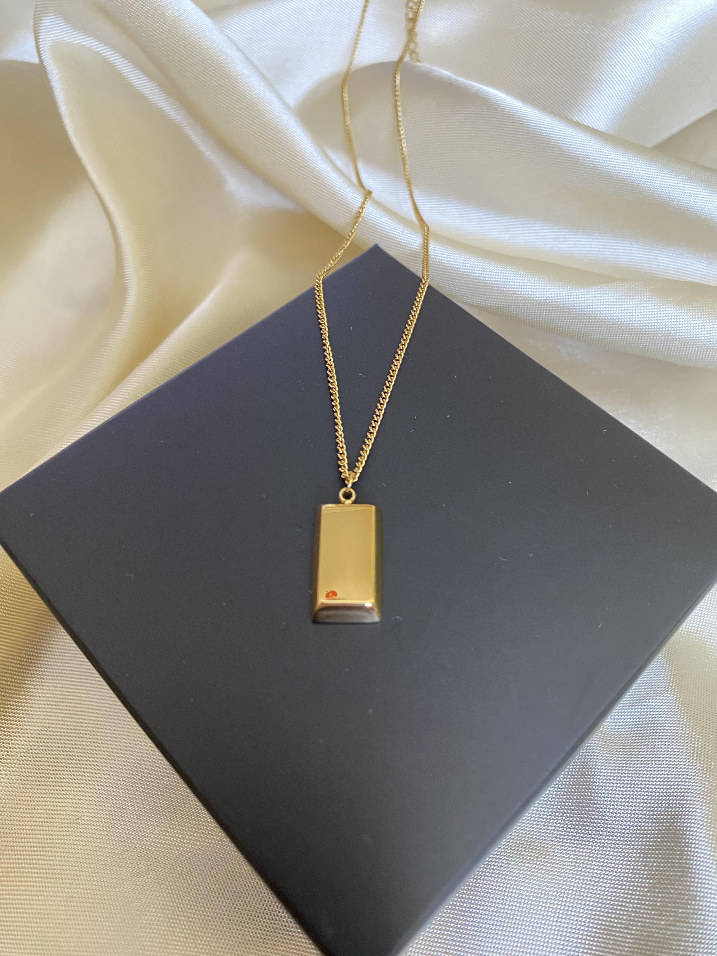 Külçe çelik kolye