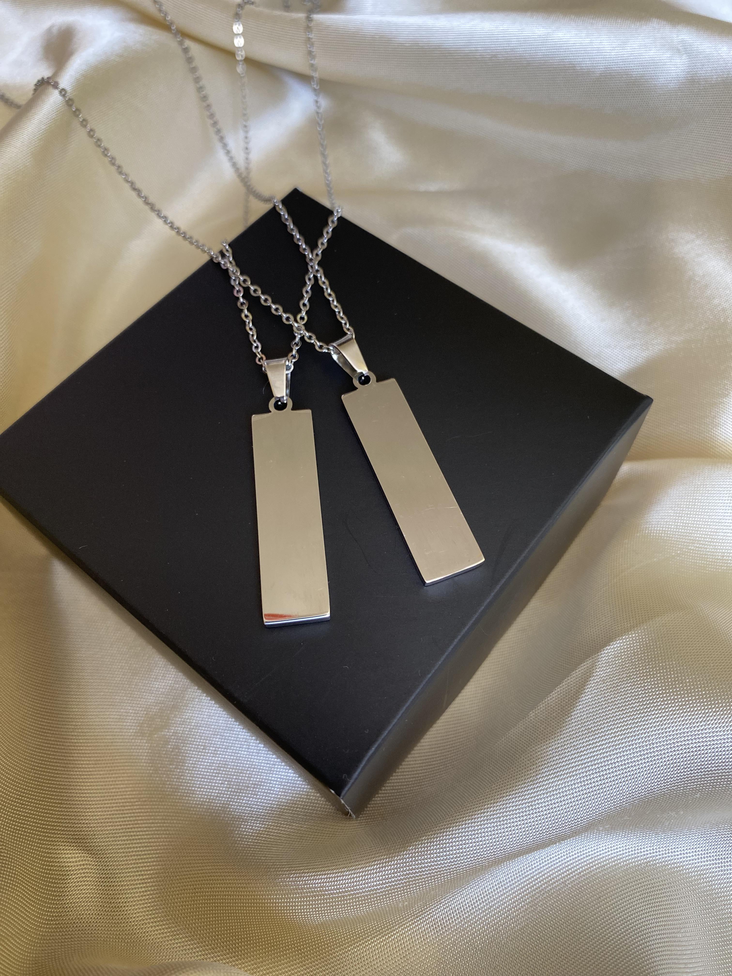 Çift gümüş renk çelik kolye